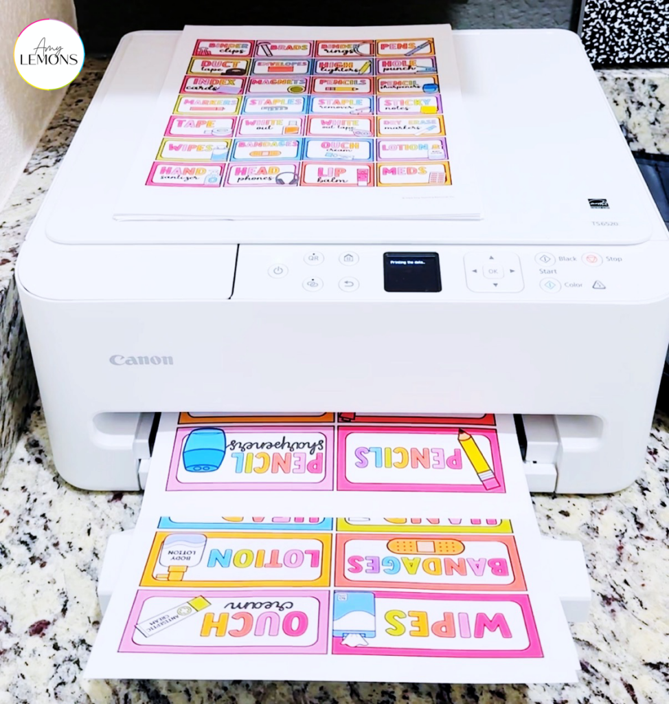 Teacher toolkit labels for wipes—bandages, lotion, pencils, etc. being printed on white printer