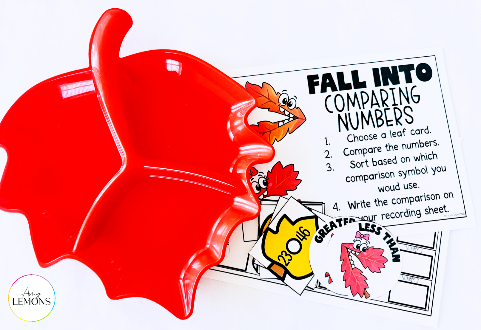 free fall comparing numbers activity with leaf tray, numbers cards, and instruction sheet